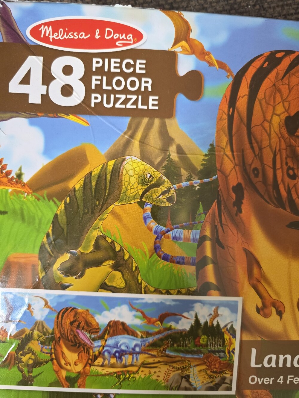 Melissa & Doug Land of Dinosaurs Puzzle - Orange & Green Dinosaurs - Picture 2 of 3